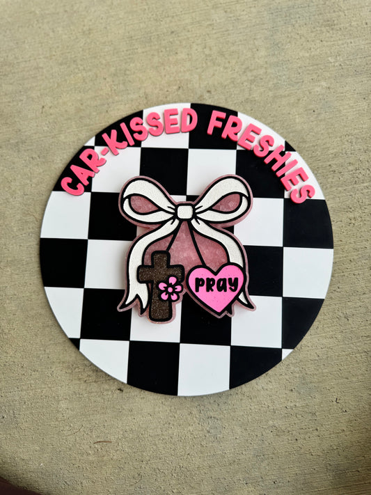 Cross and heart bow