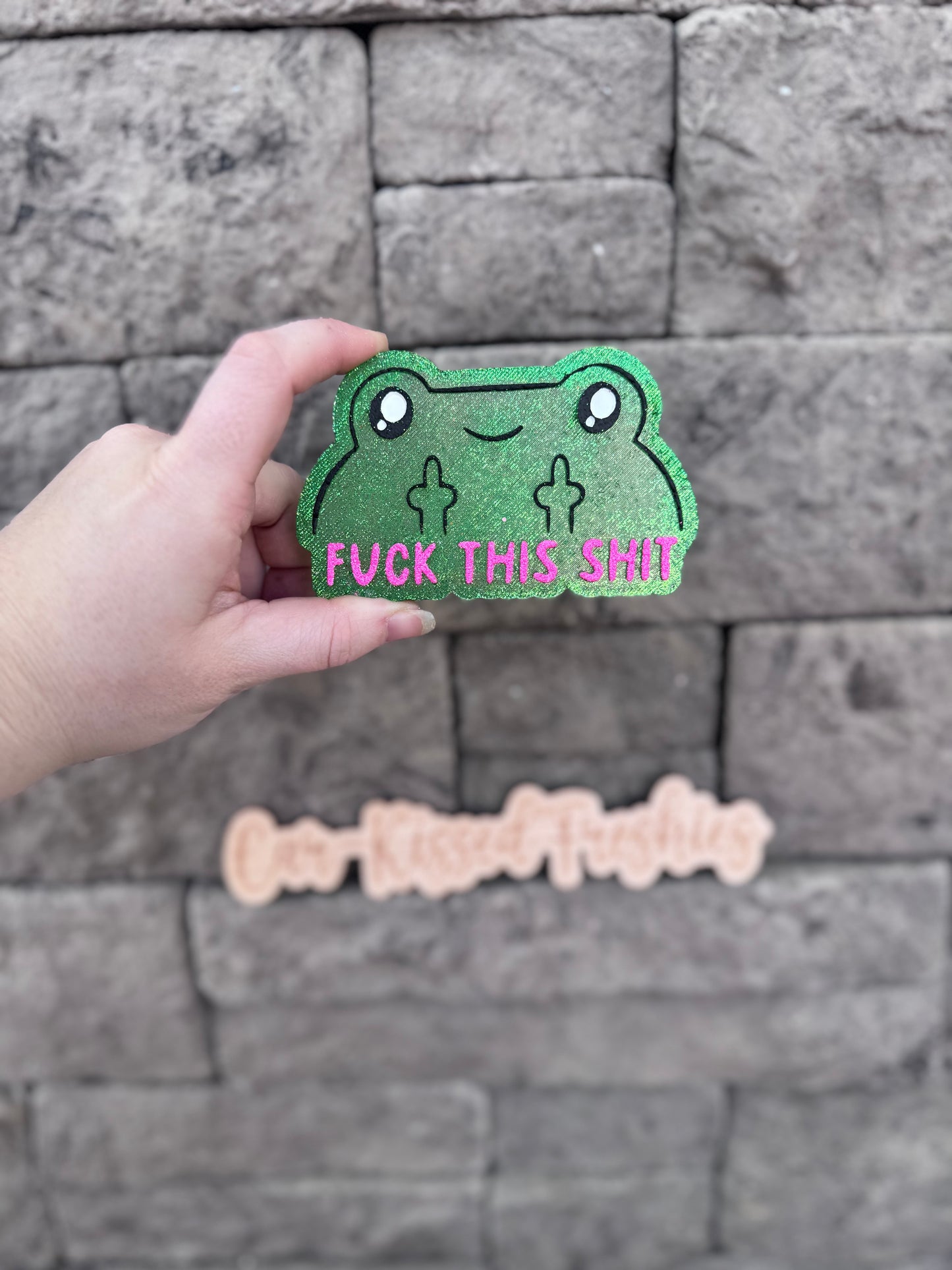 Middle finger frog